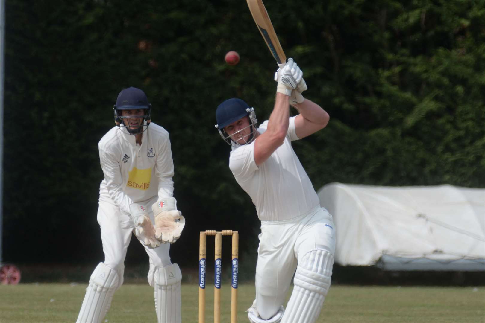 Sevenoaks keeper Miles Richards and Canterbury's Justin McVicar during the match at Polo Farm on Saturday. Picture: Chris Davey