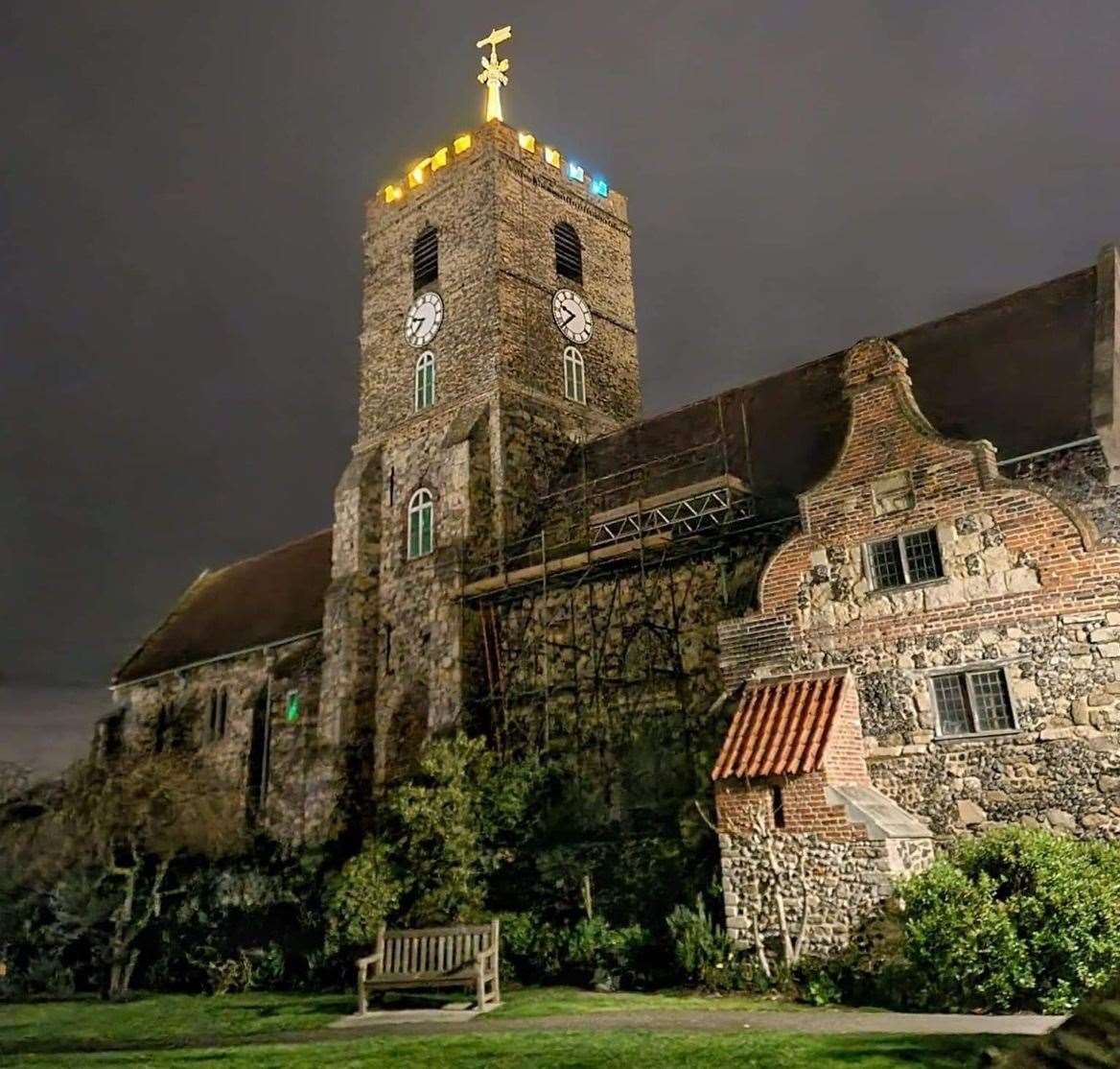 St Peter's Church in Sandwich glows with blue and yellow in support of the people of Ukraine. Picture: Darryn Jenner