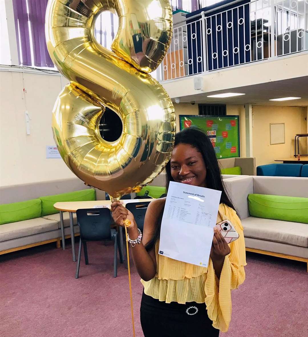 Walderslade School and Greenacre School celebrated their grades with numbered balloons to show off their grades