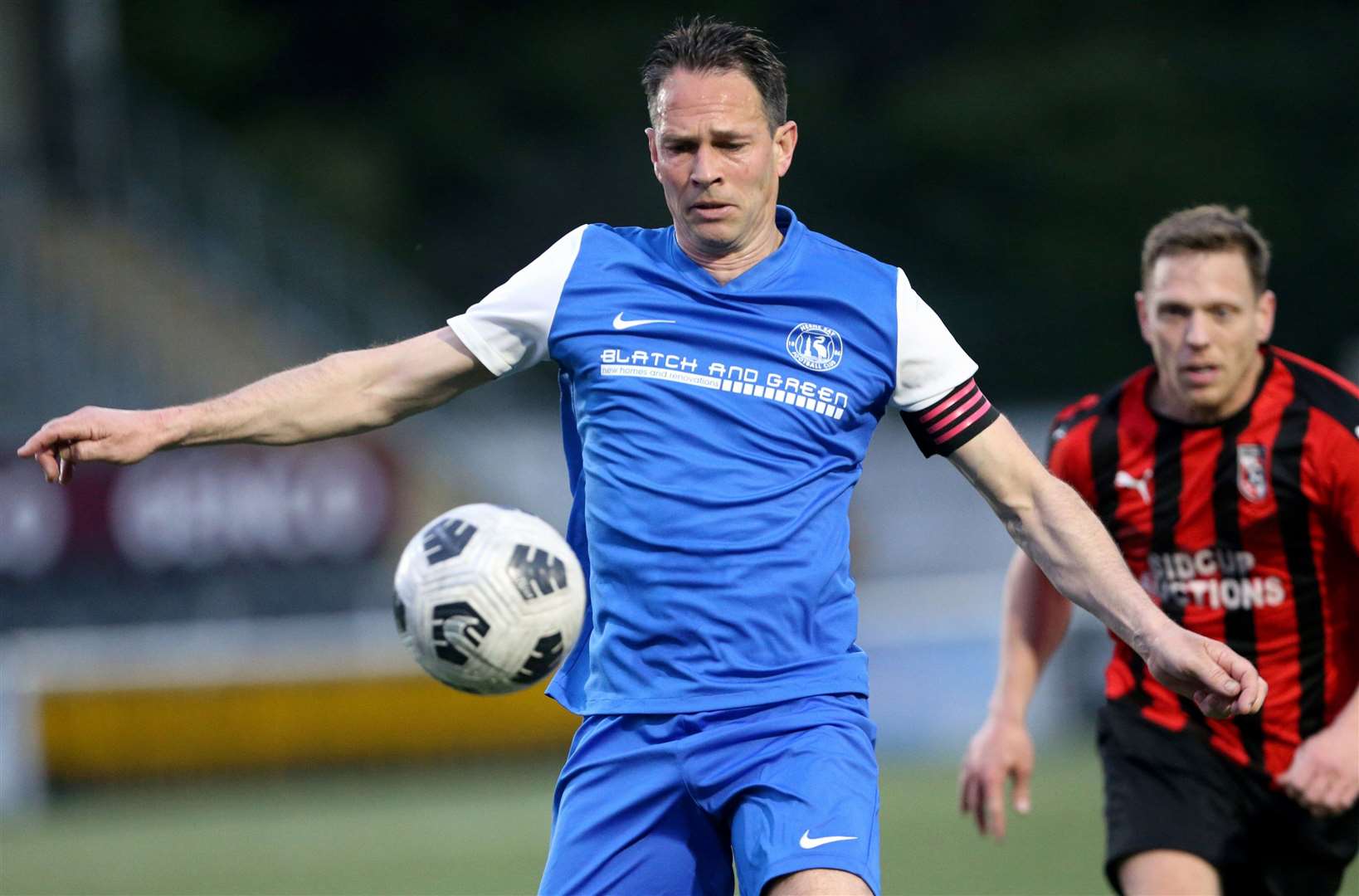 Action from the DFDS Kent Veterans Cup Final between Herne Bay (blue) and Glebe. Picture: PSP Images