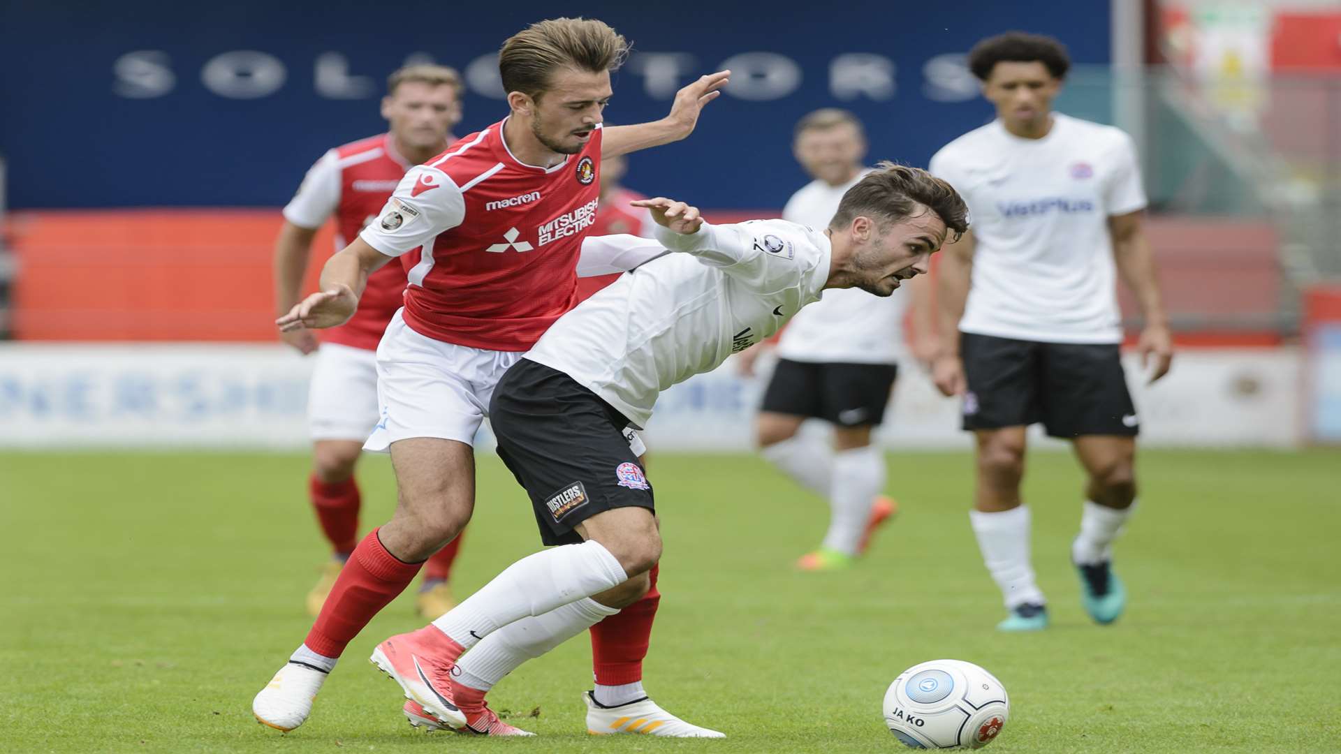 Jack Powell battles for possession against AFC Fylde Picture: Andy Payton