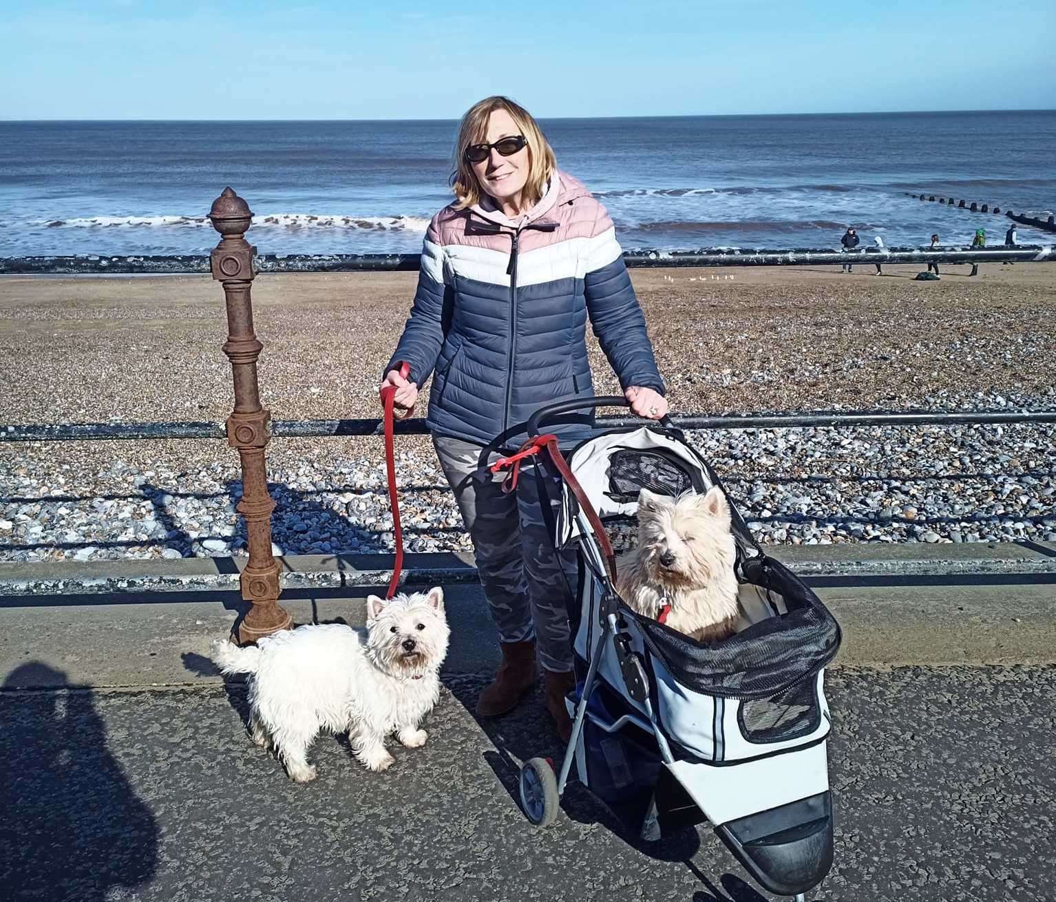 Jim's wife Sue and their two Westies who are following him in a motor home. Picture: Jim Morton