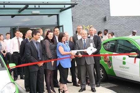 Allison Sweeney, centre manager at The Base, receives the key to the new centre from Bob Harrington, chairman of the construction company which built The Base, RG Carter