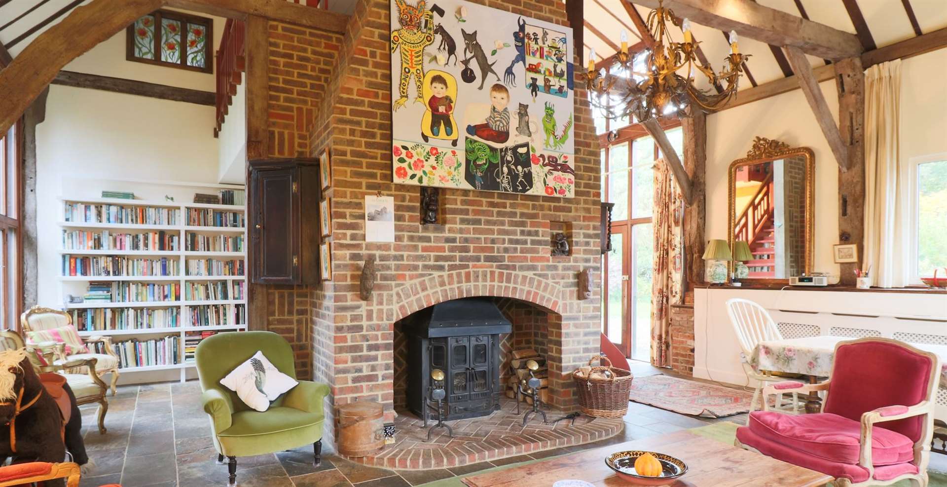 Original beams can be seen in the vaulted sitting room ceiling