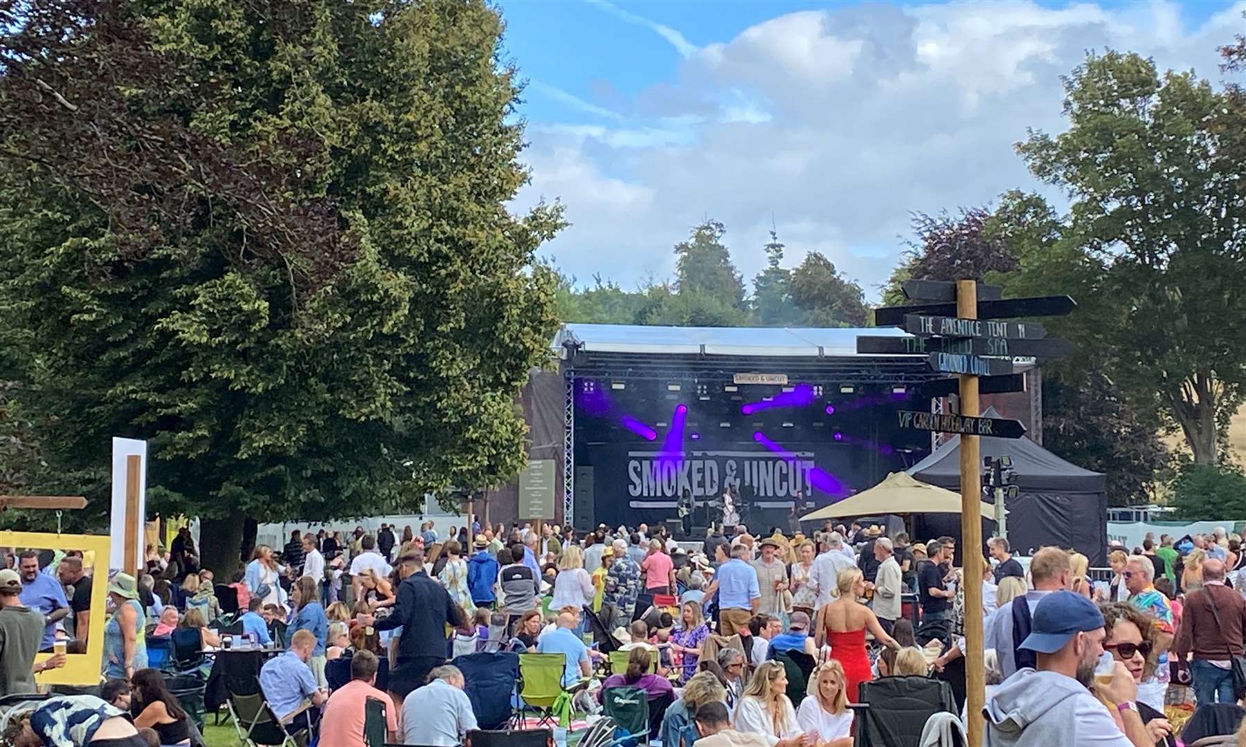 Crowds sprawled across the main green in from of the Pig at Bridge at the Smoked & Uncut Festival in Bridge, near Canterbury