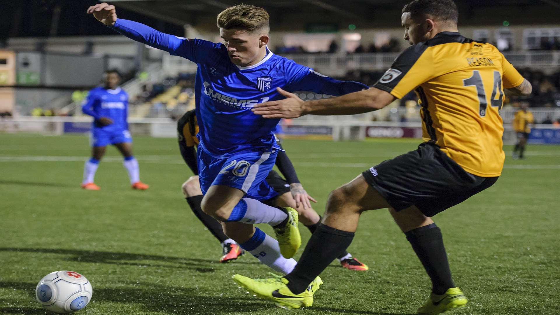 Gillingham's Darren Oldaker takes on Maidstone's Jai Reason Picture: Andy Payton