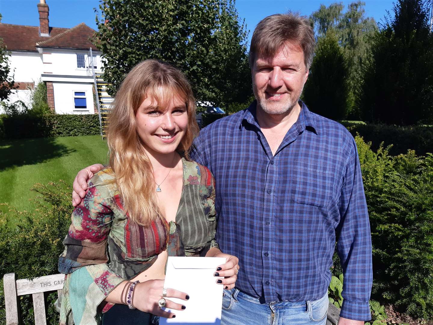 Sutton Valence School student Juliet de Banzie, 4A* and an A, with her proud father Robert de Banzie