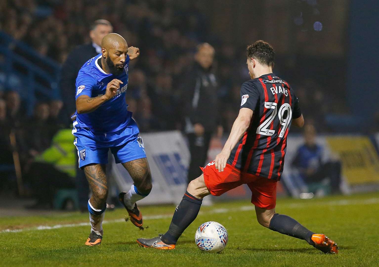 Gillingham's Josh Parker outfoxes Corry Evans. Picture: Andy Jones