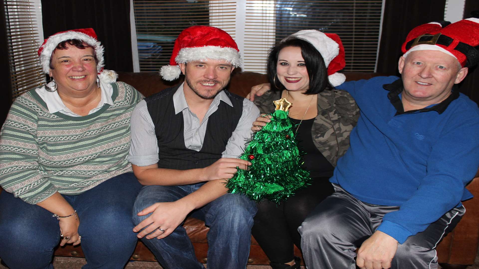 Home for Christmas: Robert Brendan with mum Margaret, dad Ian and sister Lorna-Marie Moore