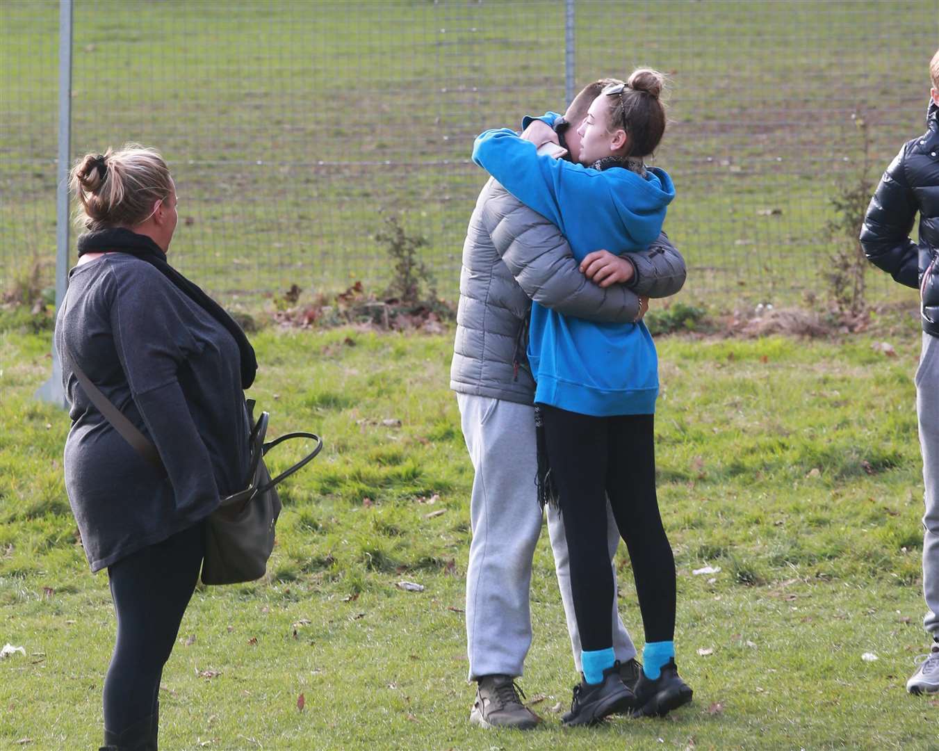 Friends console each other in their grief Picture: John Westhrop (5053080)