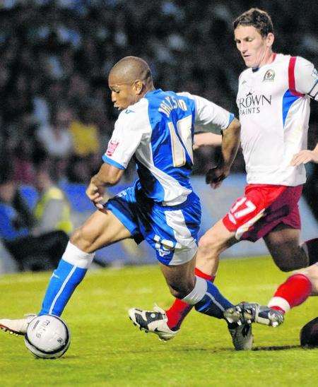 Gillingham striker Simeon Jackson takes on Blackburn's Keith Andrews