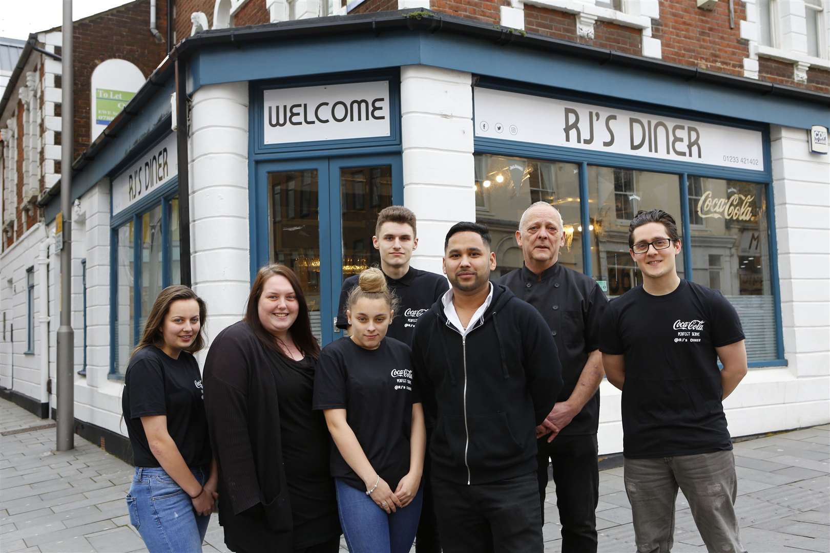 Owner MDM 'Royal' Karim with staff at the opening of RJ's Diner last year