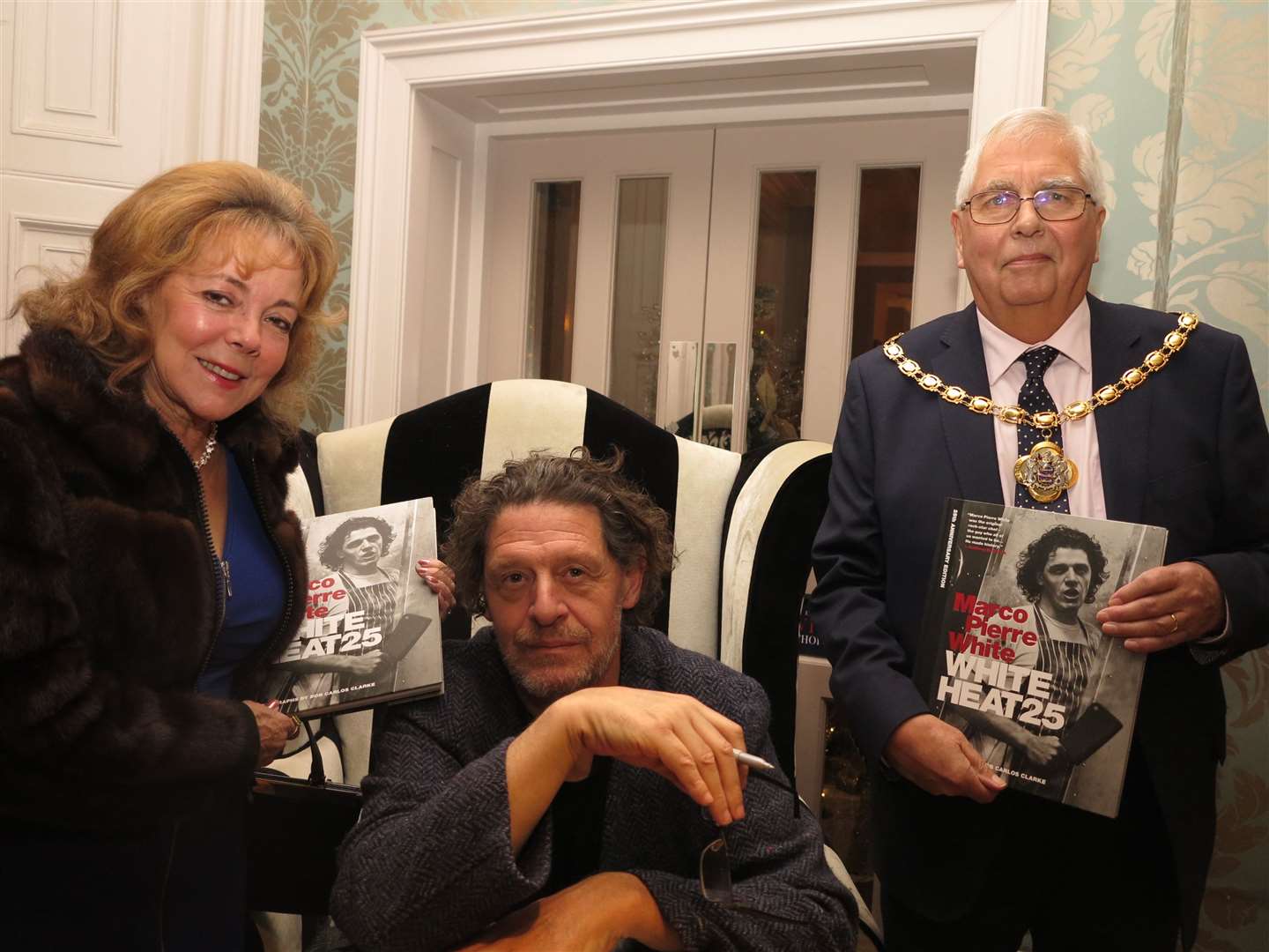 Mr White with Mike Conolly, chairman of Dover District Council, and Cllr Conolly's wife Lynne. Picture:Best Western Plus Dover Marina Hotel and Spa