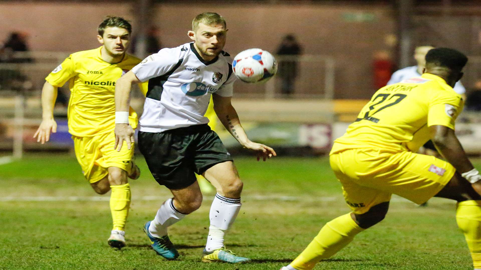 Ryan Hayes tries to make ground down the Dartford right Picture: Matthew Walker