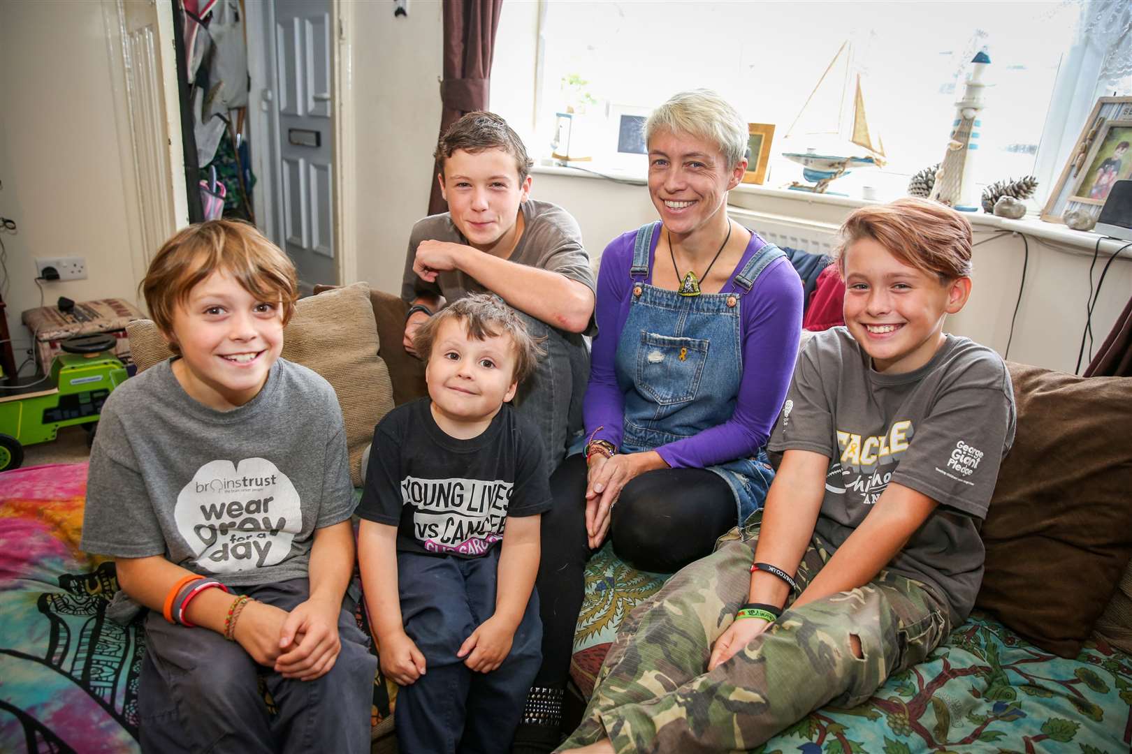 Sam Dickenson and son Seth, who was diagnosed with cancer, which led mum Sam to join Extinction Rebellion and the marches in Maidstone. Sam Dickenson with children Rufus, 9, Seph, 5, Isaac, 14, and Arthur, 12. Picture: Matthew Walker. (19830130)