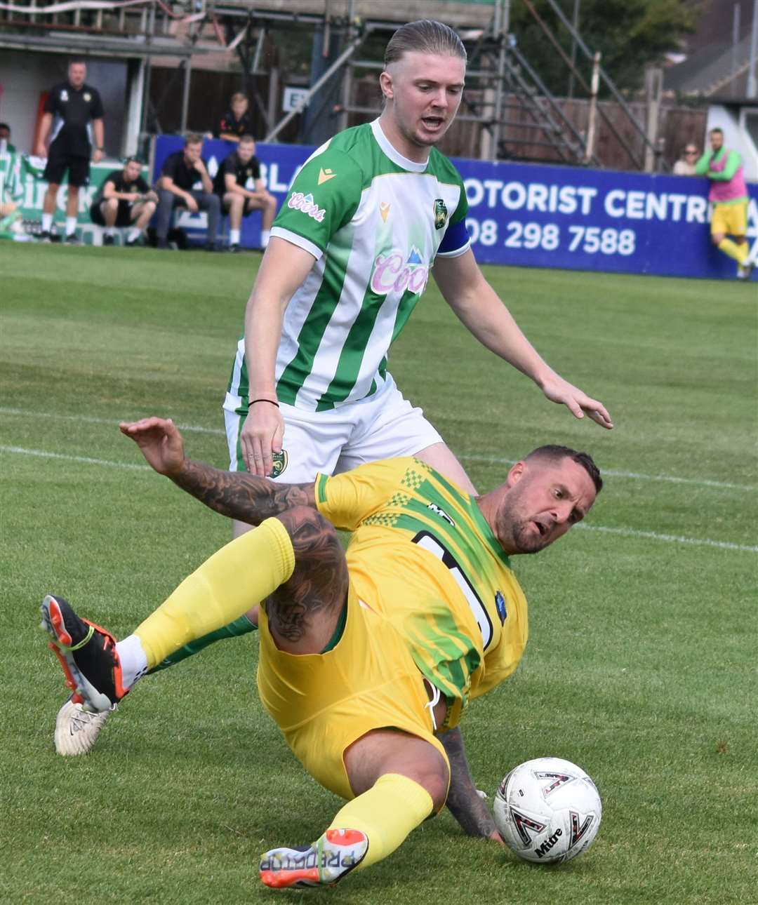 Lydd forward Kenny Pogue is brought down. Picture: Alan Coomes