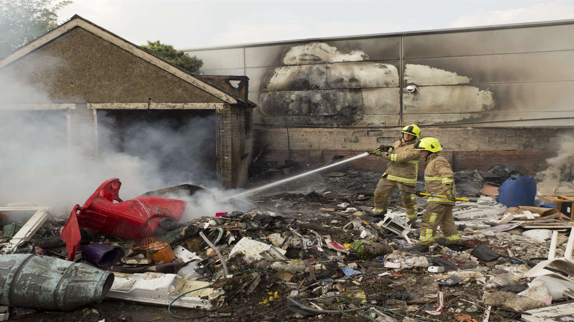 Fire crews damping down a blaze. Picture: Kent Fire and Rescue Service