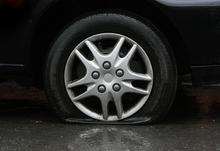 Half of motorists `can't change a wheel'