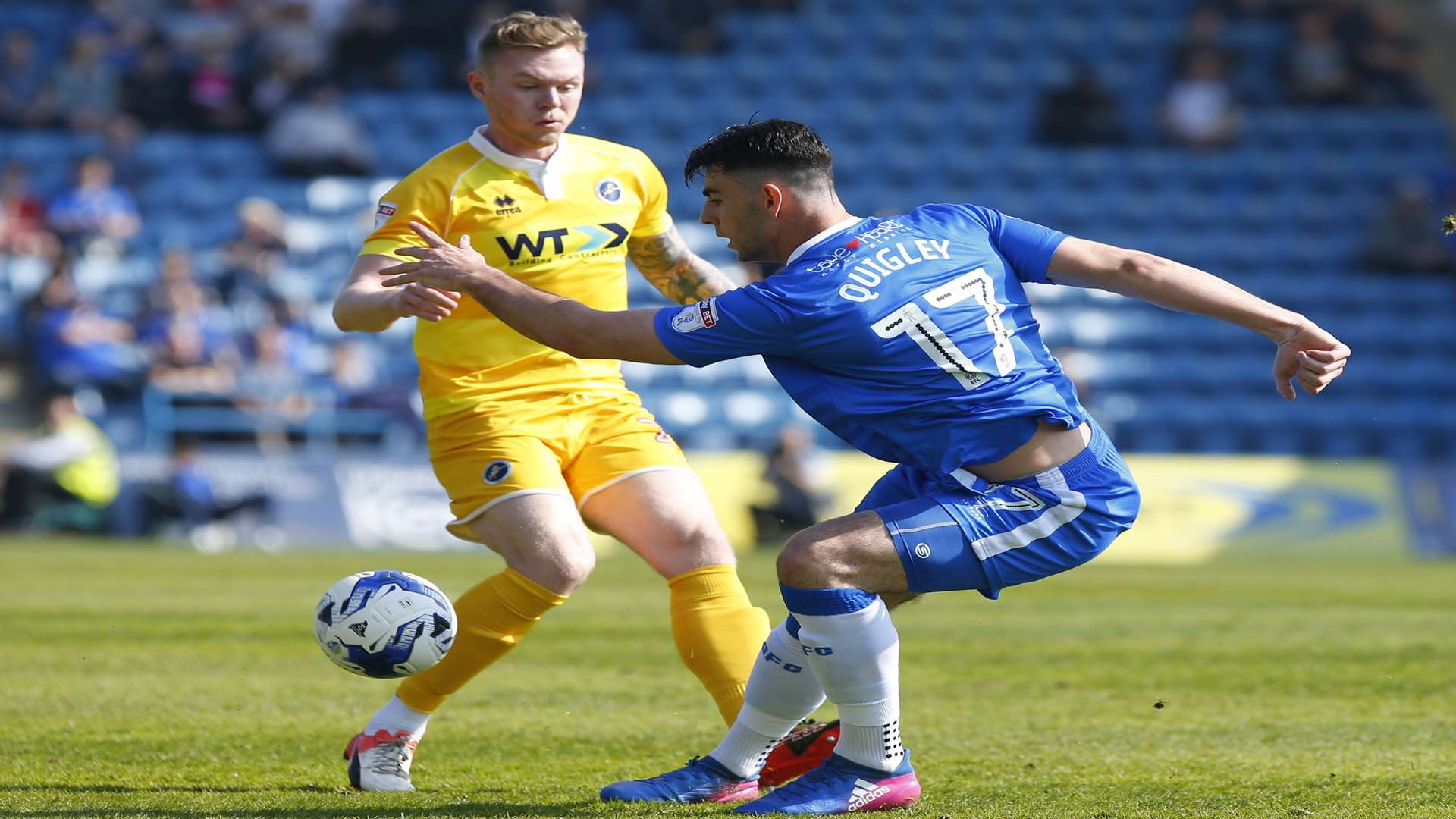 Joe Quigley plays the ball forward Picture: Andy Jones