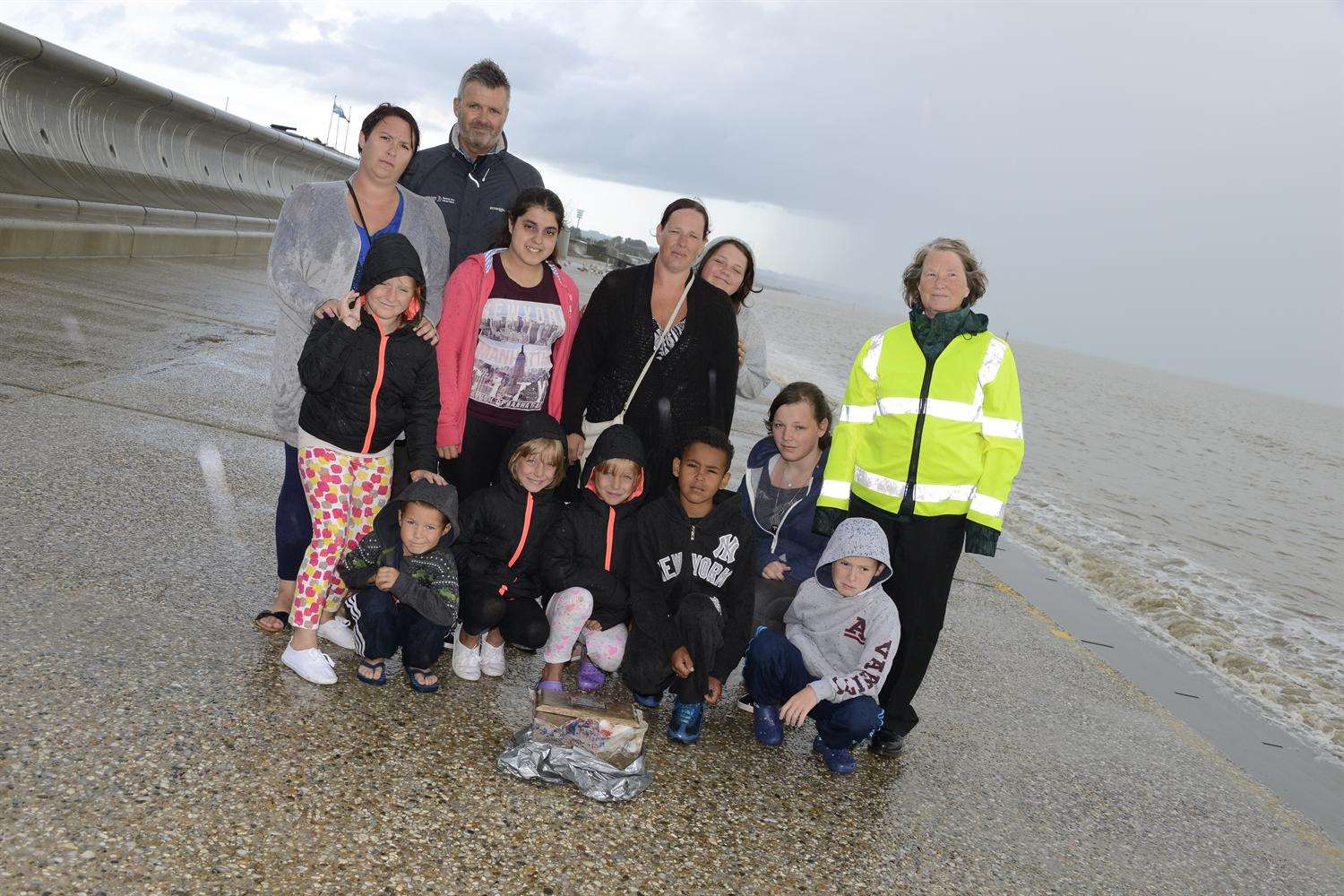 Mason Brooks and his family and friends with local community warden Sue Covus.