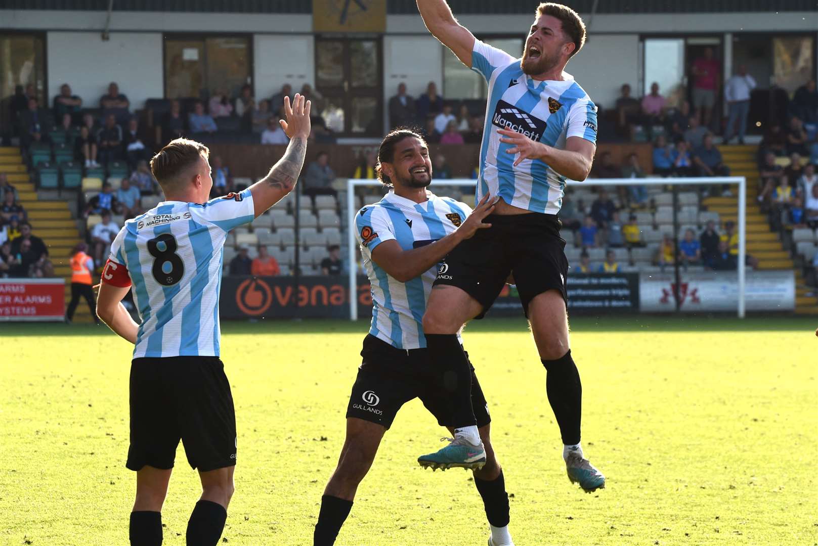 Sam Bone celebrates his winning goal at Torquay last season with Sam Corne (No.8) and Harry Kyprianou. Picture: Steve Terrell.