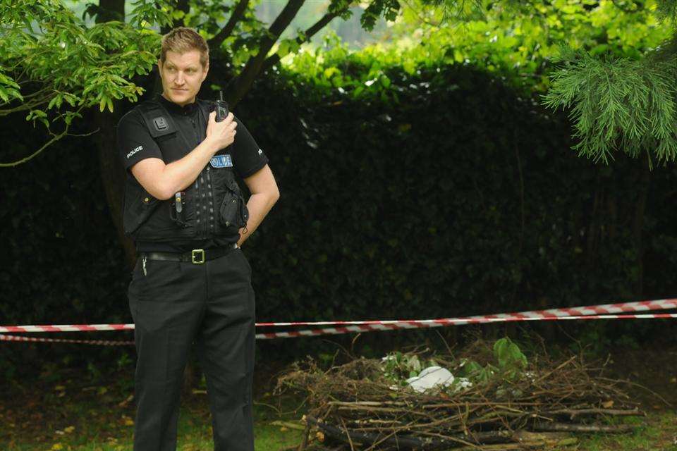 PC Andy Dennett keeps guard at the scene stopping anybody from going near the nest