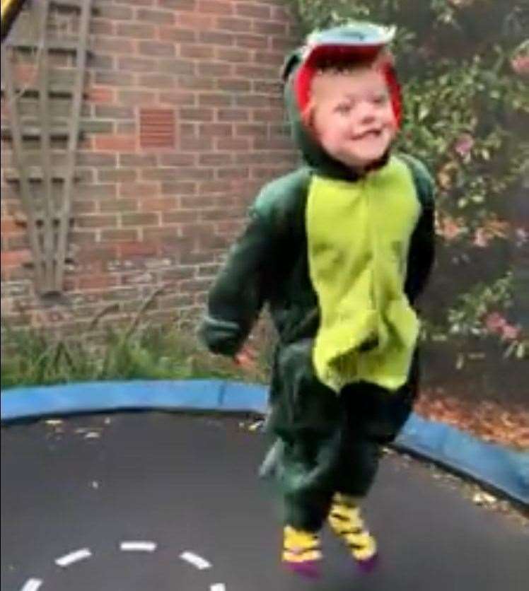 Theo sometime likes to bounce dressed as a dragon