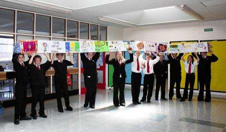 Students from the Abbey 20 tutor group make a giant scarf as part of the 1Goal Send My Friend to School scheme