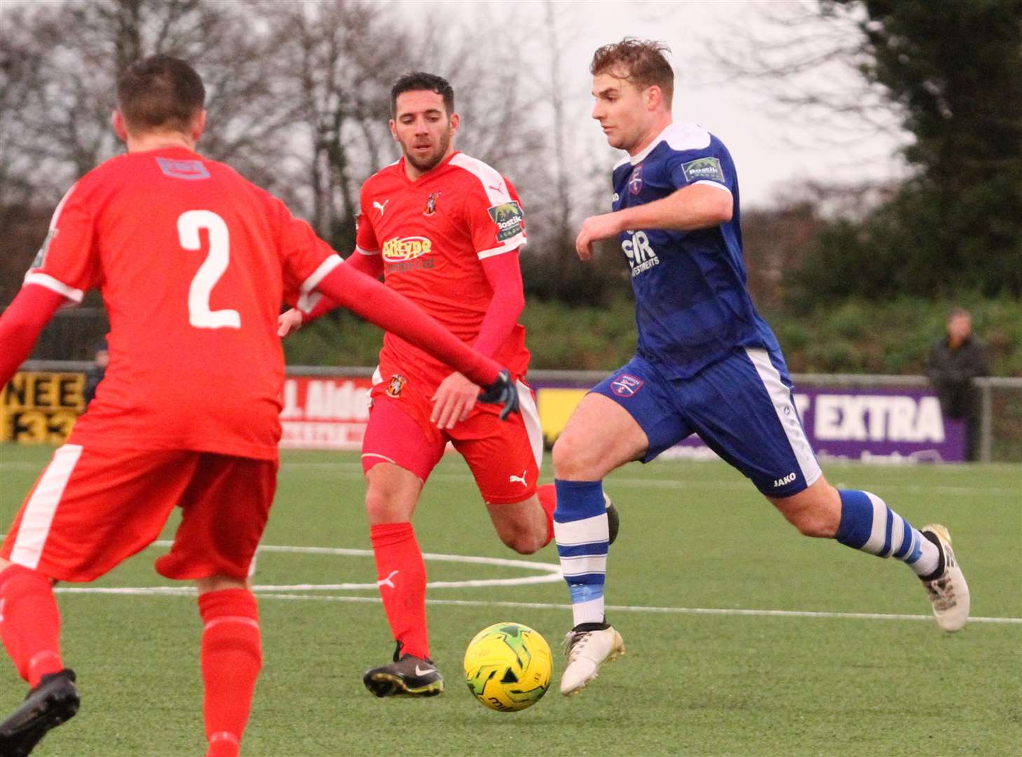 Ian Draycott tracks Sam Blackman during Folkestone's 3-1 win at Margate on New Year's Day Picture: Don Walker