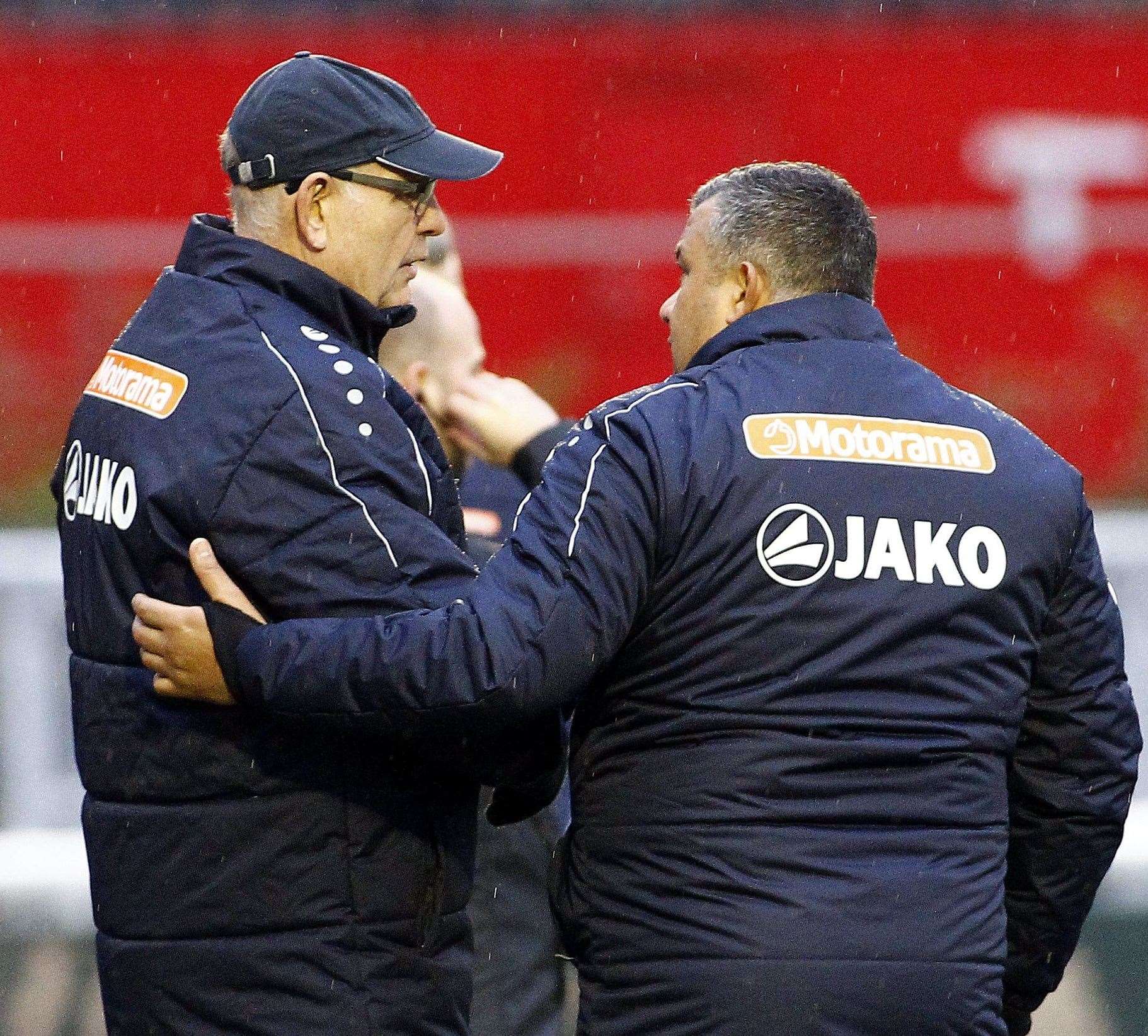 John Still and Hakan Hayrettin discuss tactics against Torquay Picture: Sean Aidan