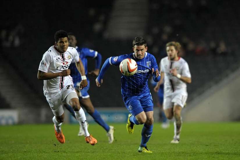 Cody McDonald on the run against MK Dons Picture: Barry Goodwin