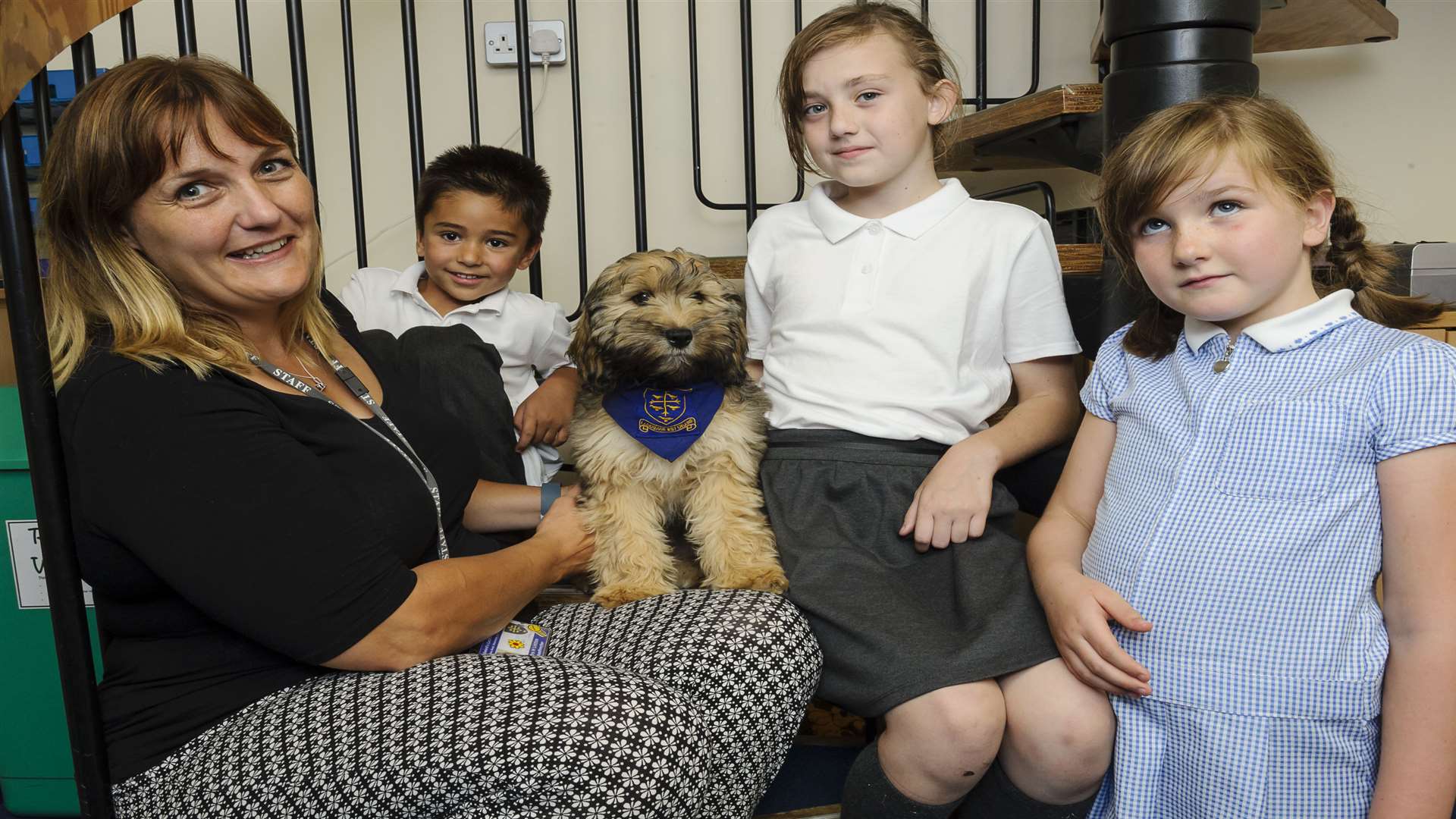 Head teacher Hayley Liddon and Bryn with Michael, five, Grace, 10, and Portia, eight.