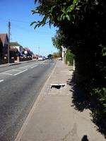 The damaged manhole covers in Minster Road, Minster