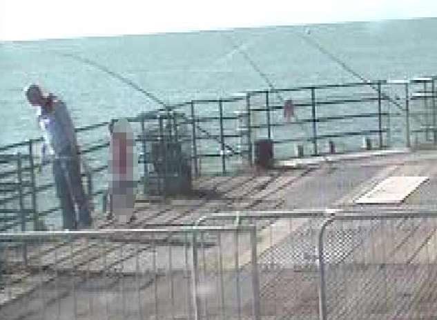 Jonathon Cudworth looks over the sea wall