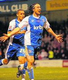 Adam Miller celebrates scoring Gillingham's equaliser against Brighton