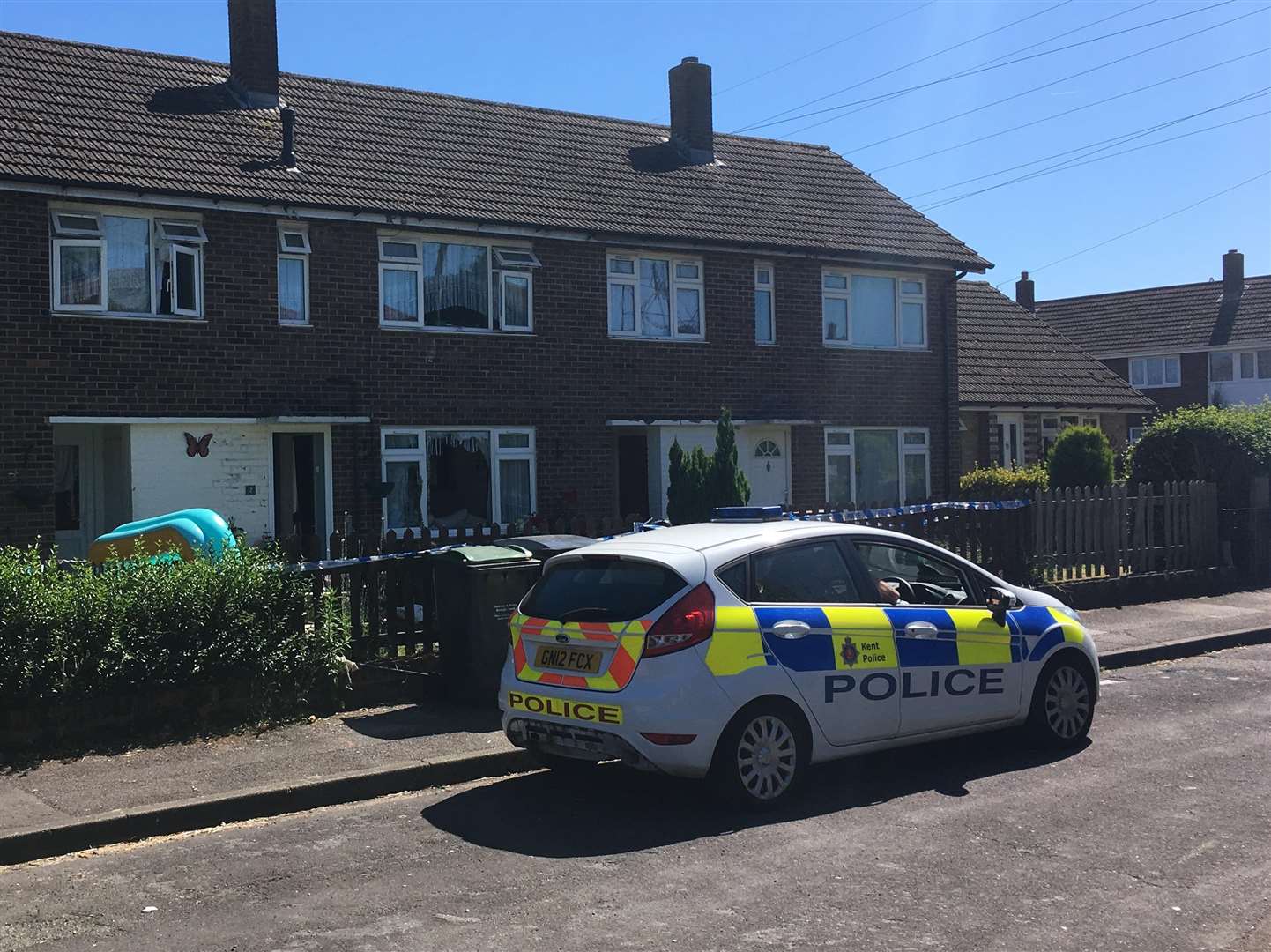 A police car at the scene