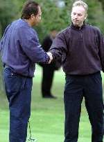 Lovell (left) is congratulated by runner-up Richard Randall