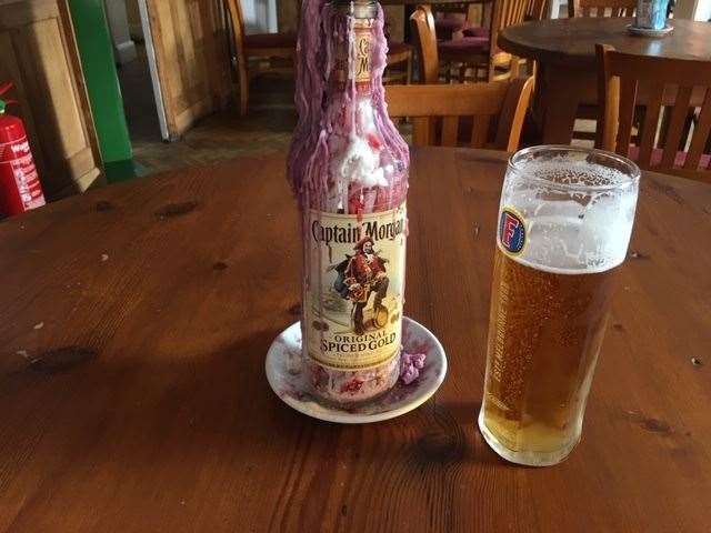 Each table displays an old bottle containing a candle (which has clearly been replaced several times) I wish I’d also been able to replace the pint of Fosters!