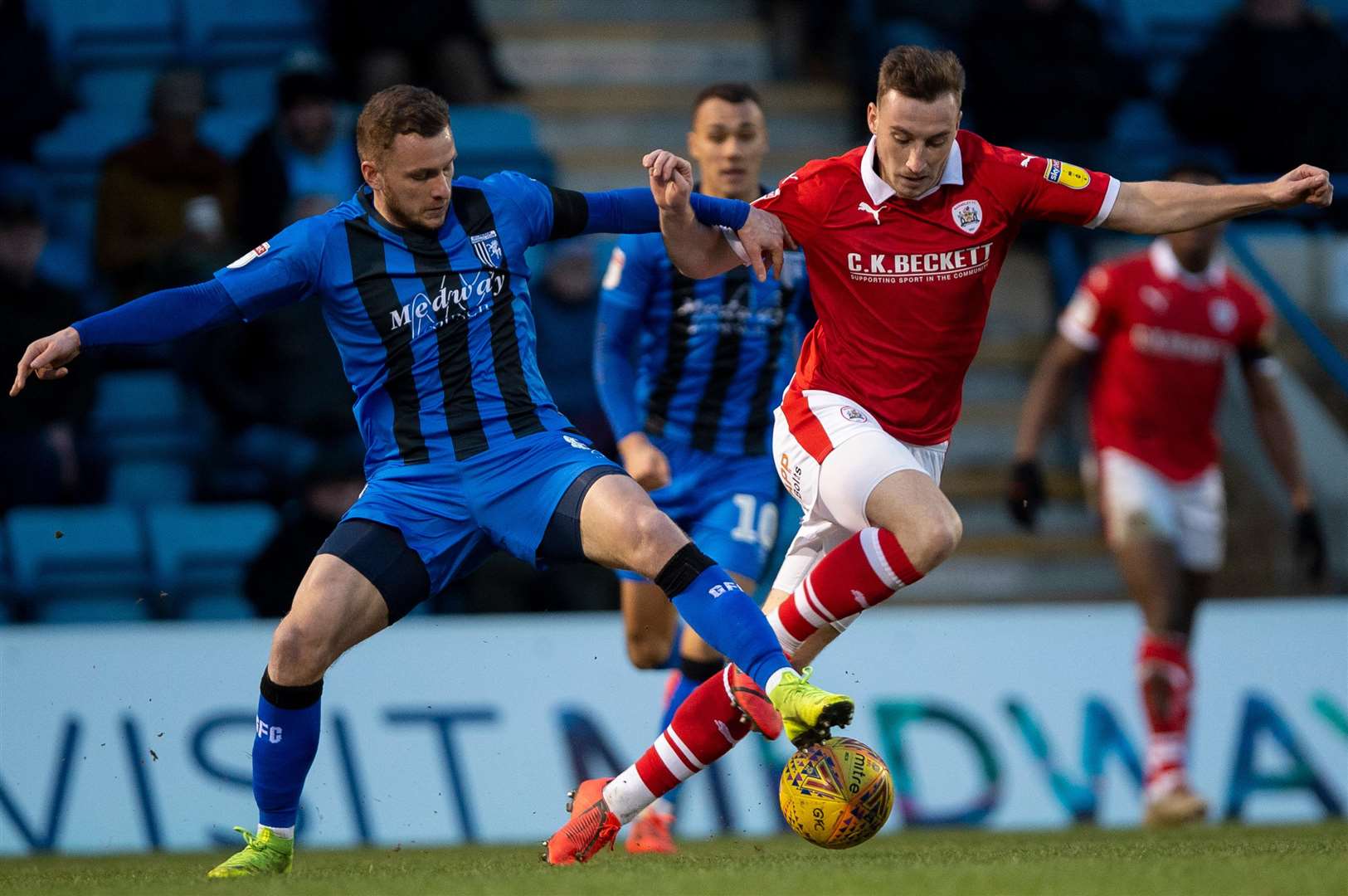 Dean Parrett gets a foot in against Mike Bahre Picture: Ady Kerry