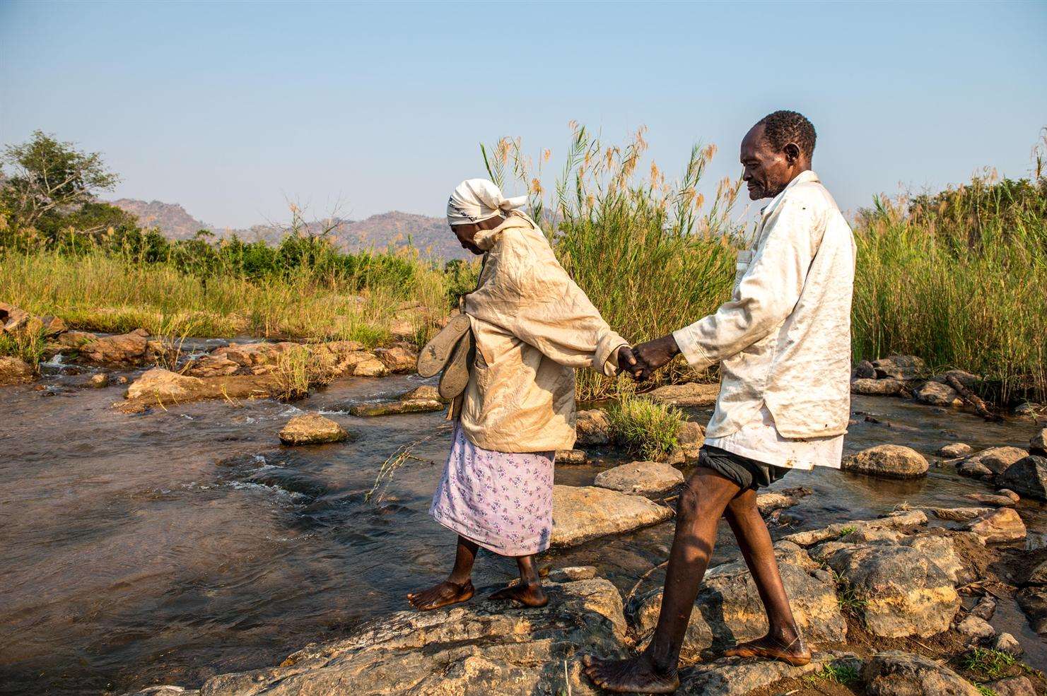 Mr Winesi is led by his wife Namalata. Picture: Rachel Palmer Photography