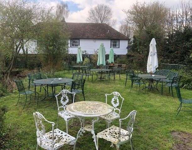 Just beyond the freshly tarmaced car park there is a great little pub garden with plenty of tables and chairs