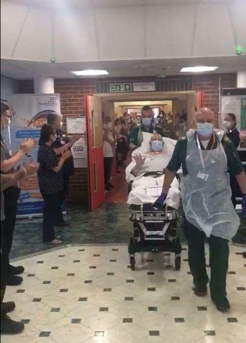 Alan being wheeled out by his lifesavers at the QEQM in June