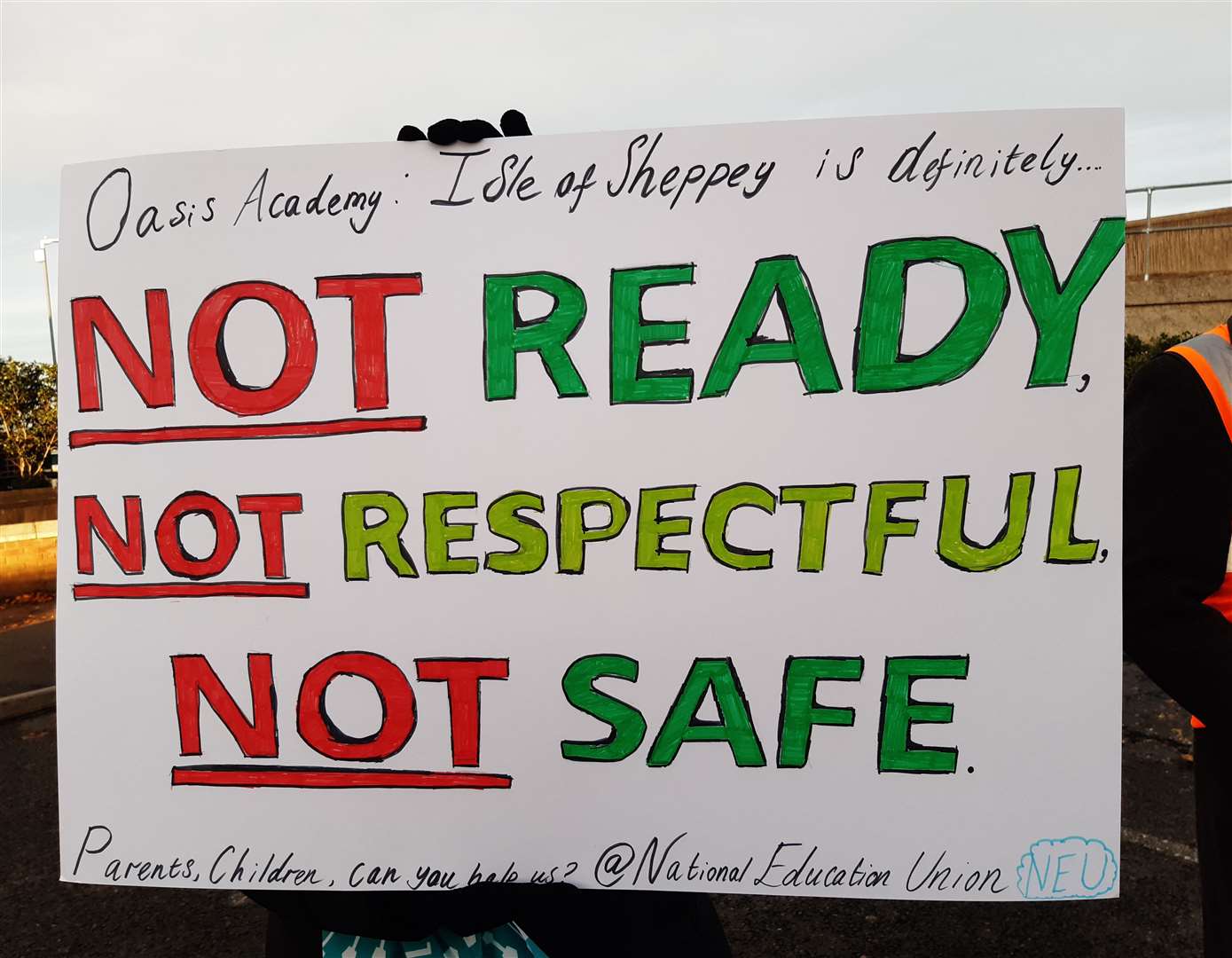 A sign being waved by one of the protesters at the Oasis Academy teacher strikes