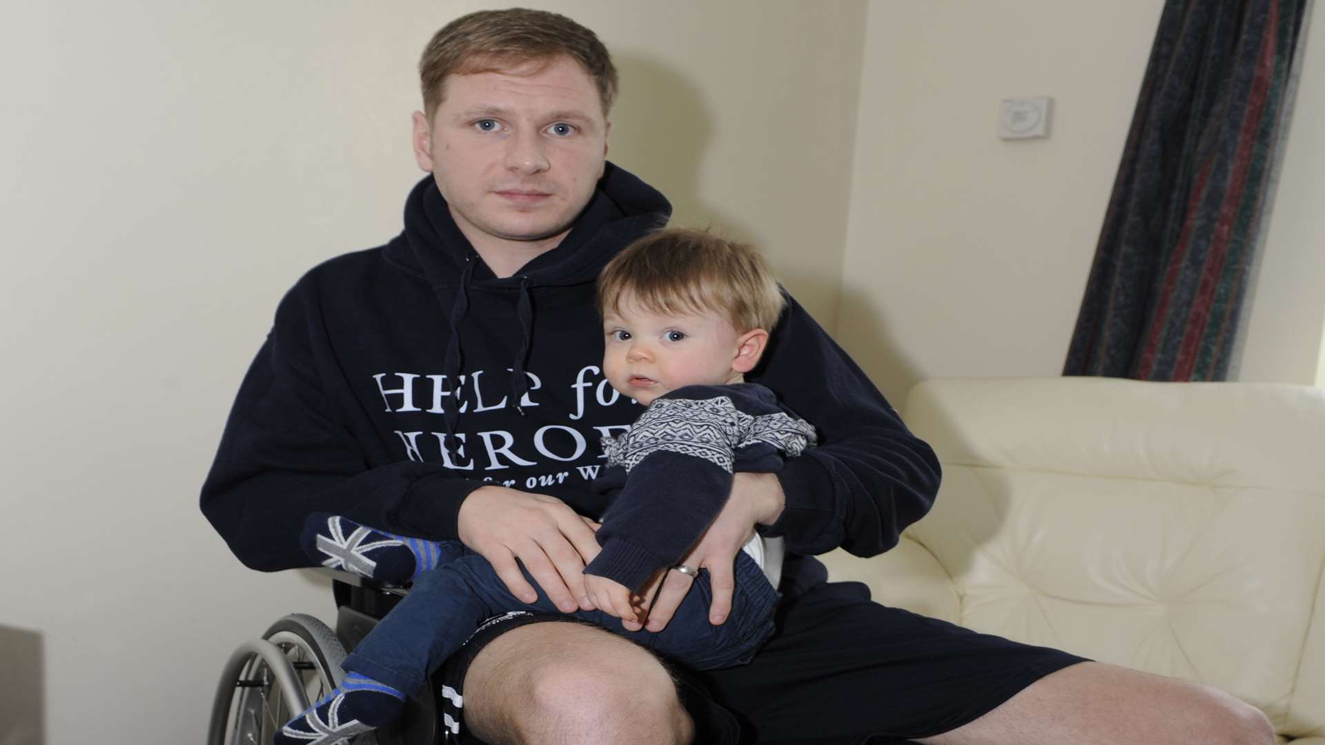 Chris with 10-month-old son Stanley