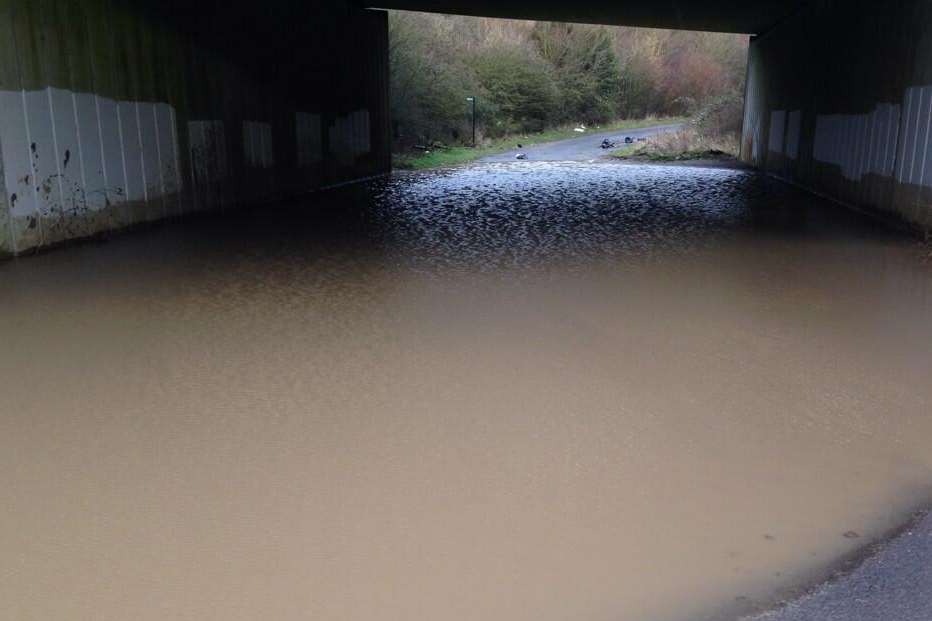 Fire crews are reminding motorists not to drive down flooded roads. Stock pic