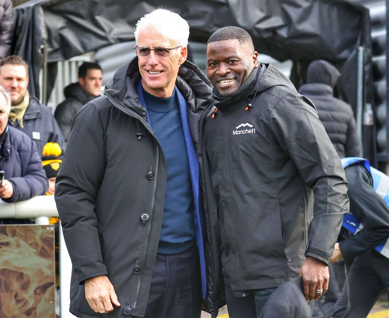 George Elokobi with mentor Mick McCarthy on the Gallagher Stadium pitch. Picture: Helen Cooper