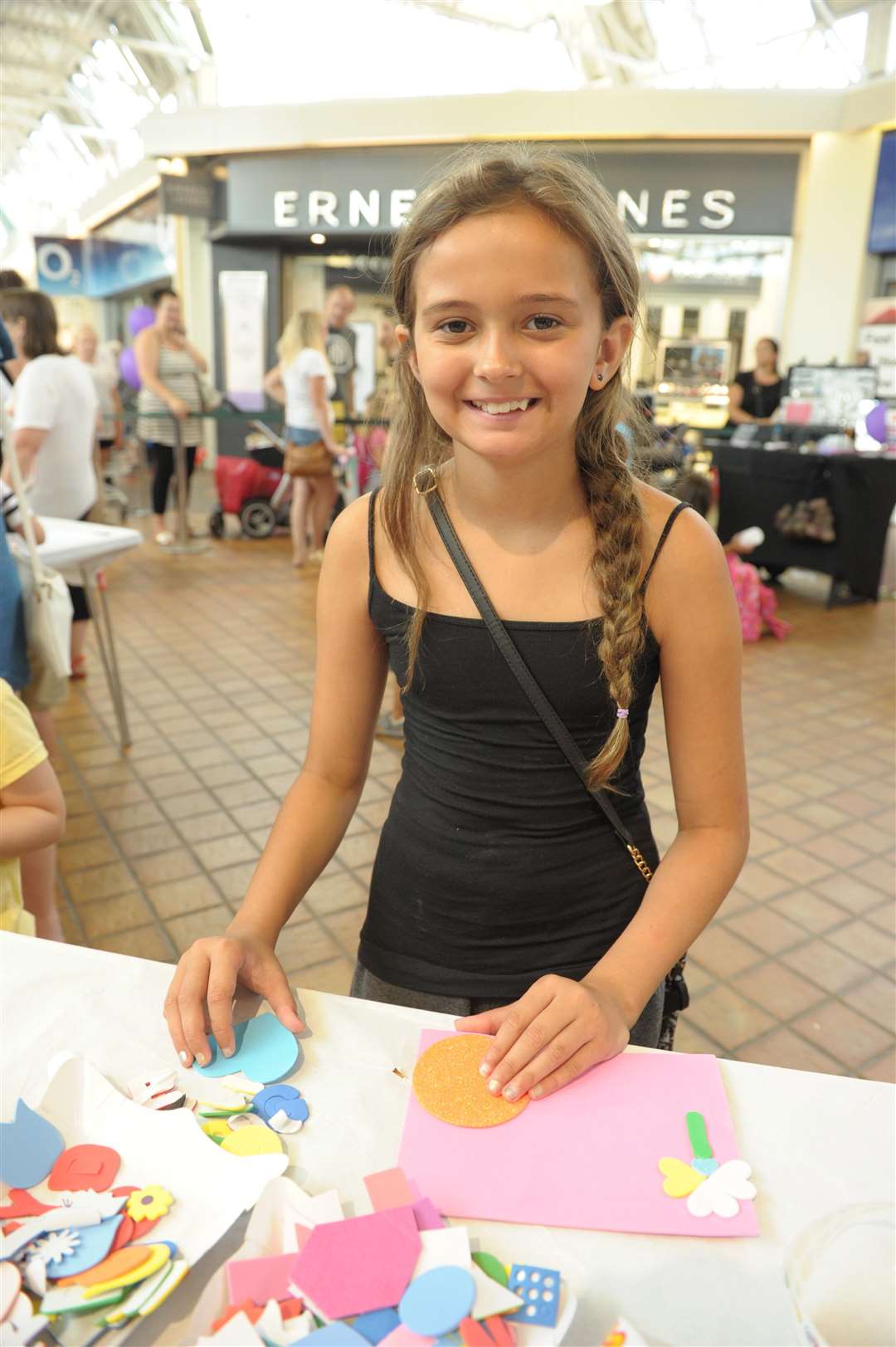 Hempstead Valley, Gillingham..Free activities week run by KMFM..Eva (9) makes a card..Picture: Steve Crispe. (3478717)