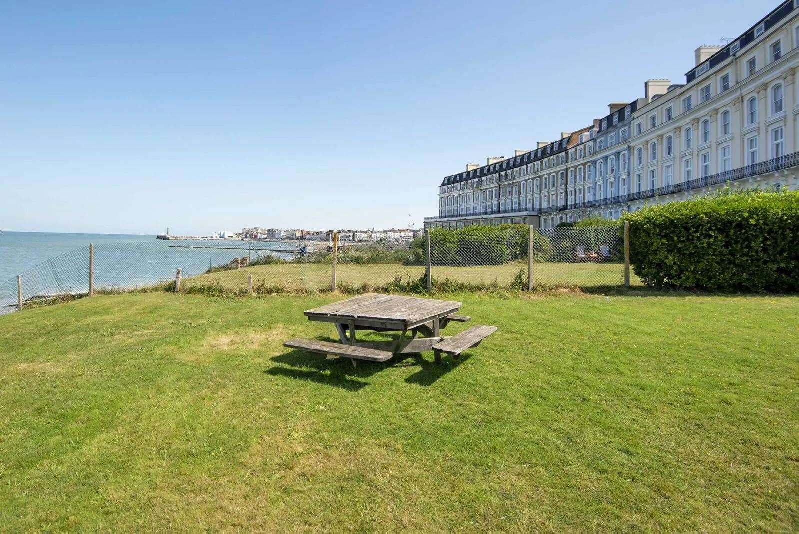 Enjoy a sunset dinner on your private lawn overlooking the beach. Picture: Cooke and Co