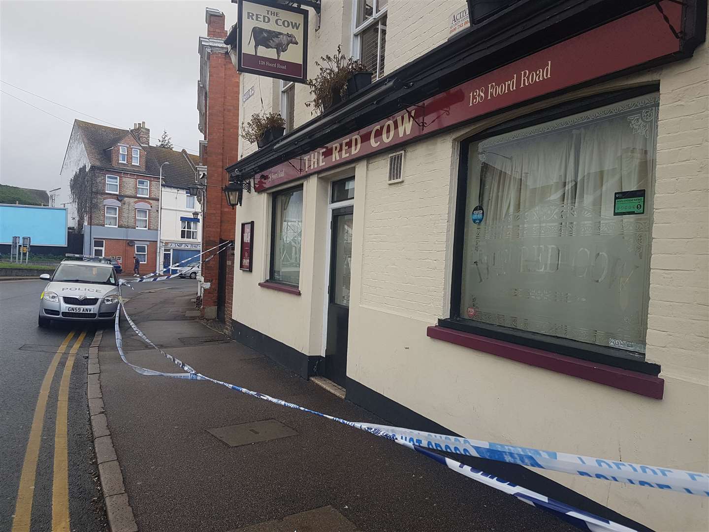 Police sealed off the Red Cow pub in Folkestone following the shooting of Mr Daniels