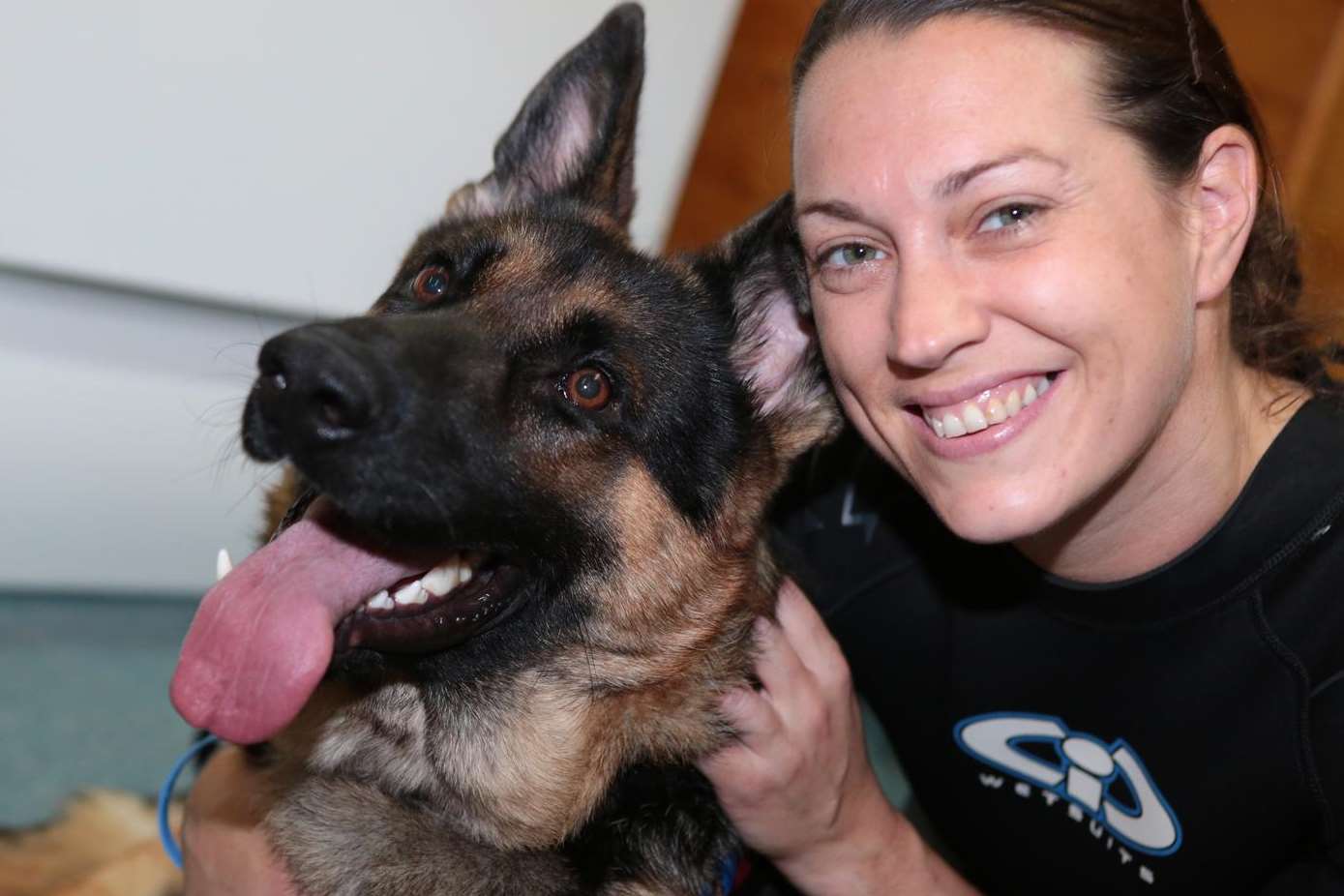 German shepherd Max with Sian Harbord at Splash Paws